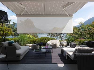 Lakeside forecourt with Stobag sun blind and large Volan